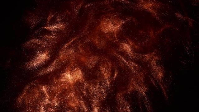 Abstract red bronze paint . Shooting on a black background. Burnished ink Bronze on Black