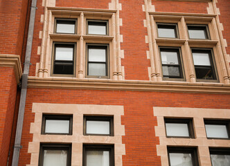 modern brick city buildings downtown that shows historic structures that shows urban apartment architecture with street background 