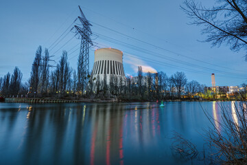 A power station in Berlin during blue with the river Spree