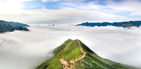 majestic scenery of Ta Xua mountain. Travelers experience on the trail of dinosaurs spine and the...