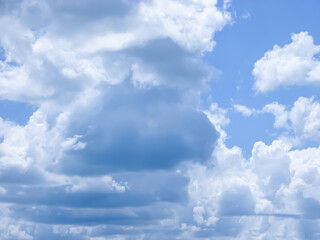 White clouds in the blue sky.