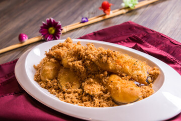 deep fried crispy eggplant vegetable and chicken floss with pepper mayonnaise sauce in white plate on red cloth wood table asian halal chinese restaurant banquet appetiser snack menu 
