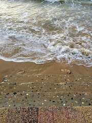 Stone stairs and waves