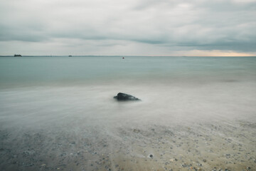 Fototapeta na wymiar Long exposure seascape shot on a stormy day