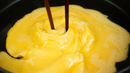 Cooking tornado omelette, close up
