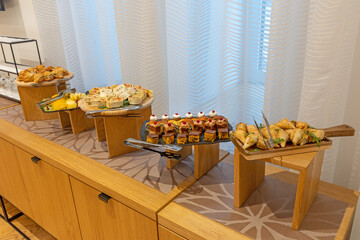 Food served on a banquet table in a meeting room