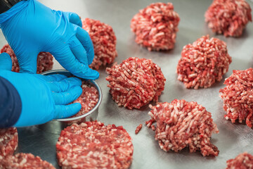Chef Preparing Burger Patties Using Ring Mold