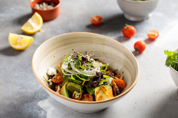 Bahraini Tikka Salad with onion, cucumber, lime and cherry tomato served in dish isolated on table top view of arabic breakfast