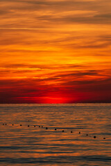 Fototapeta na wymiar Sunset on the mediterranean sea with hidden sun, Alanya