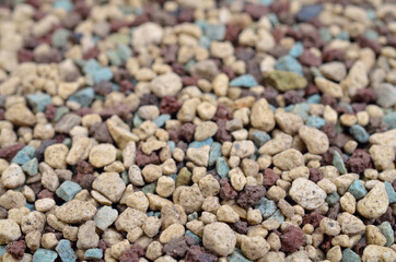 Lechuza substrate. It is a mix minerals for grow plants.