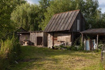 Old wooden barn. Rural courtyard	