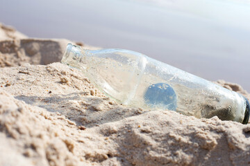 Glass bottle on the beach