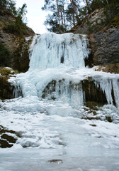 Background Icicles of ice in the winter of a frozen waterfall in a winter wonderland. Catalan Pyrenees Spain. Vertical photography