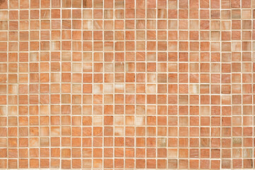 Brown mosaic tile texture. Little tile background