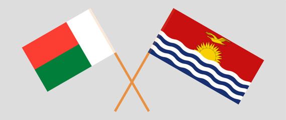 Crossed flags of Madagascar and Kiribati. Official colors. Correct proportion