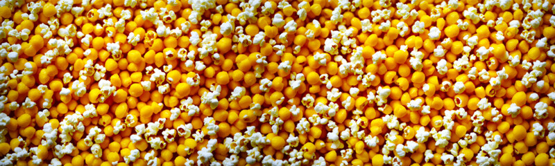 Closeup of popcorn texture with yellow and white kernels creating simple and entertaining background. Food illustration is great for cinema or movie themed designs. Vector
