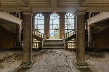 Large entrance hall with columns in old abandoned mansion, Sanatorium Imereti, Tskaltubo