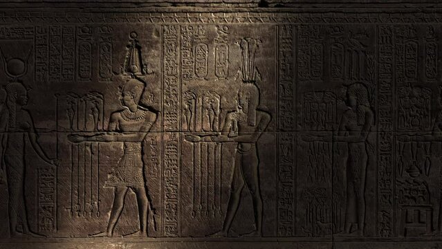 Light spot moving on hieroglyphic carvings on the wall of an ancient egyptian temple, 4k