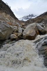 Mandakini river view in Kedarnath valley in India. Mandakini River emerges from Chorabari Glacier near Kedarnath in Uttarakhand, India. 