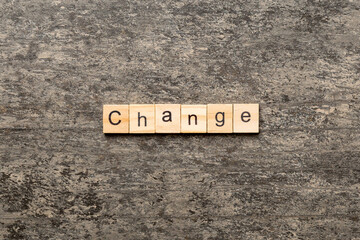 CHANGE word written on wood block. CHANGE text on cement table for your desing, concept