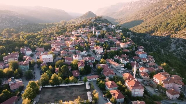 The aerial video of Ormana village in the mountains of Turkey is undeniably charming, with its quaint houses and picturesque streets nestled among the rolling hills.