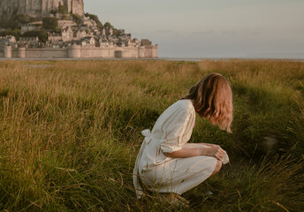 person sitting on the grass