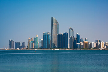 Fototapeta na wymiar Abu Dhabi skyline, UAE. Modern city with skyscrapers seen from water