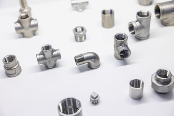 Metal Pipe Fittings or Pipe Connectors Piping and plumbing on white background