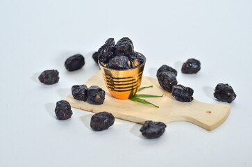 Ajwa dates or kurma ajwa are one of the special fruits of Ramadan. isolated on white background