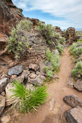 Obraz premium Rugged Rocky Trail at Lava Beds National Monument