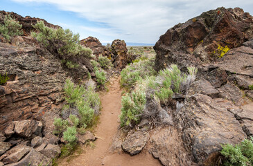 Fototapeta na wymiar Rugged Rocky Trail at Lava Beds National Monument