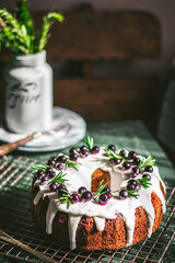 Berry pound cake on a green background.