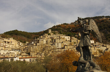 Pesche - Isernia - Molise -  In the foreground the statue of San Michele and the dragon and in the...