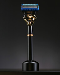 Shaver on gradient black background