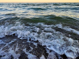 Waves crash against the Black Sea coast on a beach in the Odesa region. August, 2020