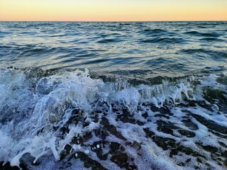 Waves crash against the Black Sea coast on a beach in the Odesa region. August, 2020