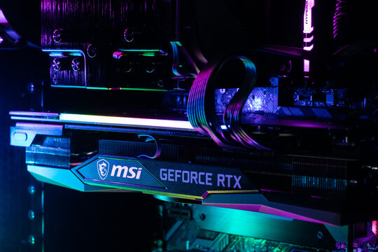 Dnipro, Ukraine - February 23, 2023: MSI Geforce RTX gaming graphics card in a open case with glow