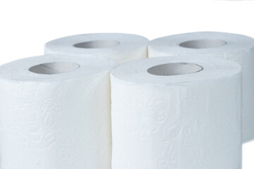 White toilet paper rolls on the white background. Hygiene concept.