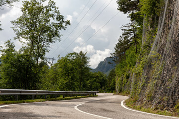 No cars on a hairpin bend of road to Plöcken Pass, Passo di Monte Croce Carnico in Italian, is a...