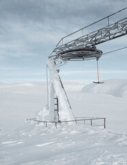 skilift in snowy mountains