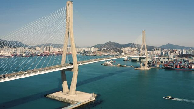 Aerial view of Busan Harbor Bridge on a sunny day