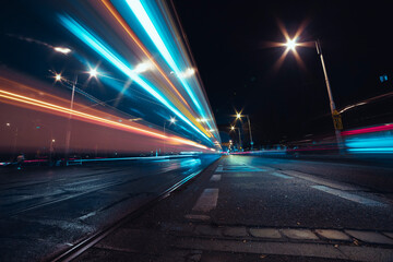 Fototapeta na wymiar city street at night with vehicles light trails