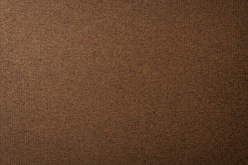 Fototapeta na wymiar 質感のある焦げ茶色のクラフトペーパーの背景テクスチャー