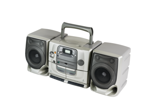 Old stereo boom box portable radio, cd, cassette tape player and recorder machine with cut out background.
