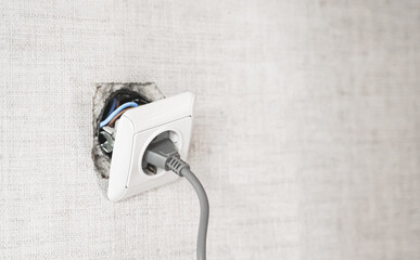 Dangerous bad,broken socket,plug in bathroom,falling out of wall. Outlet installation in old...