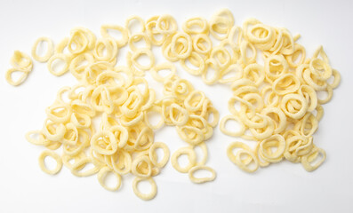 Chips from onion rings on a white background.