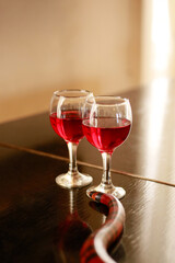 glass of red wine with snake 