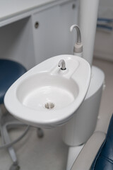 Dental spittoon. Dentist chair.