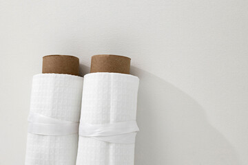 White cotton Fabric Rolls Mockup. Pieces of textile tied with ribbons