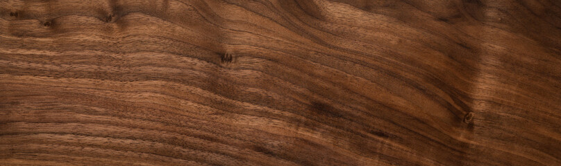 Fototapeta premium Extra long black walnut wood plank texture background. Walnut natural texture background. Wood texture background. 